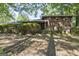 Traditional brick home with mature landscaping and inviting front porch at 6520 Rickenbacker Cir, Morrow, GA 30260