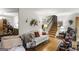 Cozy living room features hardwood floors and a staircase to the upper level at 6520 Rickenbacker Cir, Morrow, GA 30260