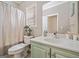 Bathroom with a shower/tub combo, a large mirror and plenty of counter space at 3338 Hackmatack Dr, Kennesaw, GA 30152