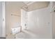 Bright bathroom showcasing a toilet, bathtub, and shower with neutral wall color at 3338 Hackmatack Dr, Kennesaw, GA 30152