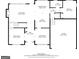 Detailed floor plan of the first floor showcasing a living room, kitchen, dining room, and garage at 3338 Hackmatack Dr, Kennesaw, GA 30152