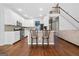 Bright kitchen featuring white cabinets, a breakfast bar and stainless-steel appliances at 3338 Hackmatack Dr, Kennesaw, GA 30152