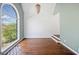 Open-concept living room filled with natural light with hardwood floors at 3338 Hackmatack Dr, Kennesaw, GA 30152