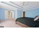 This main bedroom includes an ensuite bathroom and carpeted floors at 3338 Hackmatack Dr, Kennesaw, GA 30152
