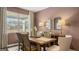 Formal dining room with rustic wooden table and chairs at 350 Friendship Oak Way, Hampton, GA 30228