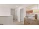 Upstairs hallway featuring stylish decor, natural light, and neutral tones at 350 Friendship Oak Way, Hampton, GA 30228