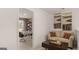Upstairs loft featuring sofa, desk space, and view of neighborhood at 350 Friendship Oak Way, Hampton, GA 30228