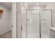 A frameless glass shower with built in shelves and a white shower pan at 350 Friendship Oak Way, Hampton, GA 30228