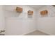 Walk-in closet with white wire shelving for optimal storage and organization at 350 Friendship Oak Way, Hampton, GA 30228