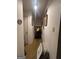 Hallway with decorated walls and a light fixture on the ceiling at 100 Gran De Ct, South Fulton, GA 30349
