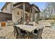 Backyard dining, pool, and outdoor grill at 202 Firefly Ct, Peachtree City, GA 30269