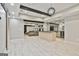 Spacious basement with an island bar and a cozy seating area at 202 Firefly Ct, Peachtree City, GA 30269