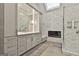 Bathroom features a walk-in glass shower, fireplace, skylight, and custom vanity at 202 Firefly Ct, Peachtree City, GA 30269
