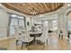 View from dining area looking towards the fireplace and sitting area, showing the open layout at 202 Firefly Ct, Peachtree City, GA 30269