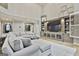 Living room with built-in entertainment center and hardwood floors at 202 Firefly Ct, Peachtree City, GA 30269