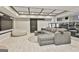 Comfortable living room featuring a large couch, bean bag and home theater seating at 202 Firefly Ct, Peachtree City, GA 30269
