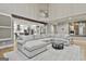 Open concept living room with hardwood floors and neutral decor at 202 Firefly Ct, Peachtree City, GA 30269