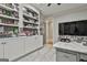 Office with a ceiling fan, neutral decor, and ample storage at 202 Firefly Ct, Peachtree City, GA 30269