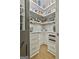 Organized pantry with custom shelving, drawers, and countertops, providing ample storage space at 202 Firefly Ct, Peachtree City, GA 30269