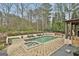 Outdoor pool and jacuzzi at 202 Firefly Ct, Peachtree City, GA 30269
