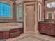 Elegant bathroom with a soaking tub, tiled shower, and double vanity at 101 Glen Eagle Way, Mcdonough, GA 30253