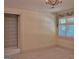 Bedroom with shutters on the windows and ensuite bathroom at 101 Glen Eagle Way, Mcdonough, GA 30253