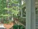 View of exterior with gazebo and second story balcony with decorative wrought iron railing at 101 Glen Eagle Way, Mcdonough, GA 30253