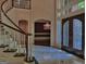 Elegant foyer showcasing a staircase, marble floors, chandelier and an entry door at 101 Glen Eagle Way, Mcdonough, GA 30253