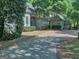 Beautiful light blue home exterior with brick accents and lush landscaping, offering great curb appeal at 101 Glen Eagle Way, Mcdonough, GA 30253