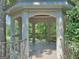 Interior of the gazebo featuring archways and decorative railing overlooking the scenic landscape at 101 Glen Eagle Way, Mcdonough, GA 30253