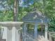 Gazebo featuring tiled roof and open sides for enjoying the surrounding landscape at 101 Glen Eagle Way, Mcdonough, GA 30253