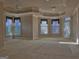Expansive living room with large windows and backyard access at 101 Glen Eagle Way, Mcdonough, GA 30253