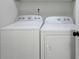 Modern laundry room with brand new Whirlpool washer and dryer for your convenience at 180 Bentley Way, Fayetteville, GA 30214