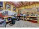 Organized workshop area in the basement, featuring workbenches and tools at 220 Edna Ruth Ln, Mcdonough, GA 30253