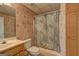 Bathroom featuring wallpaper, vanity, toilet, and floral shower curtain at 220 Edna Ruth Ln, Mcdonough, GA 30253