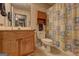 Bathroom featuring a vanity, toilet, and patterned shower curtain at 220 Edna Ruth Ln, Mcdonough, GA 30253