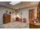 Inviting bedroom featuring neutral walls, carpet, and comfortable furniture at 220 Edna Ruth Ln, Mcdonough, GA 30253