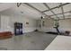 Spacious garage featuring epoxy floors and ample storage space at 220 Edna Ruth Ln, Mcdonough, GA 30253
