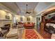 Spacious living room featuring hardwood floors, a fireplace, and neutral wall paint at 220 Edna Ruth Ln, Mcdonough, GA 30253