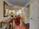 View from hall into living room with hardwood floors and fireplace at 220 Edna Ruth Ln, Mcdonough, GA 30253