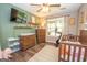 Well-lit Bedroom features wood furnishings, natural light, and calming neutral decor at 120 Trisha Ln, Grantville, GA 30220