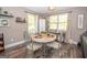 Cozy dining area with bright windows and table with seating for four people at 120 Trisha Ln, Grantville, GA 30220
