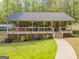 Charming single-story home featuring a spacious front porch, craftsman details, and a well-maintained lawn at 120 Trisha Ln, Grantville, GA 30220