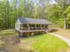 Charming single-story home featuring a spacious front porch, craftsman details, and a well-maintained lawn at 120 Trisha Ln, Grantville, GA 30220