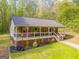 Charming single-story home featuring a spacious front porch, craftsman details, and a well-maintained lawn at 120 Trisha Ln, Grantville, GA 30220