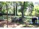 Outdoor backyard featuring a patio set and grill for outdoor dining and entertaining at 4793 Davenport Nw Trce, Acworth, GA 30101