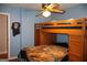 Cozy bedroom features bunk beds and a unique lion print blanket at 4793 Davenport Nw Trce, Acworth, GA 30101