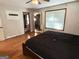 A bedroom with a window, closet, and bed at 4793 Davenport Nw Trce, Acworth, GA 30101