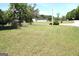 Property with a large grassy yard and street sign reading 'Meadow Lark' at 4793 Davenport Nw Trce, Acworth, GA 30101