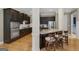 Gourmet kitchen with stainless steel appliances, granite countertops, and a breakfast bar with seating at 189 Willowleaf Way, Sharpsburg, GA 30277